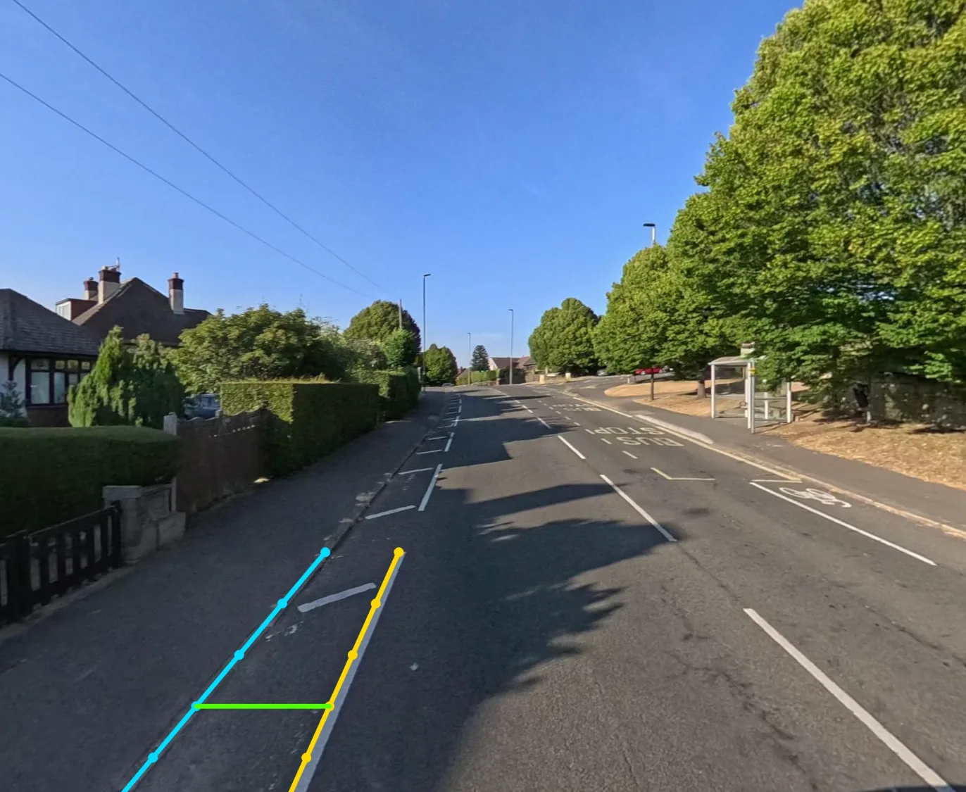 Street-level photo with computer-vision traced kerb and cycle lane lines measuring a 1.02 m offset
